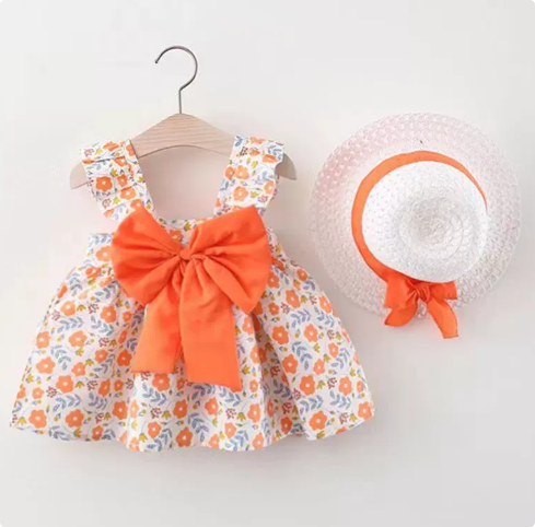 Orange floral dress with a large orange bow and coordinating ribboned straw hat