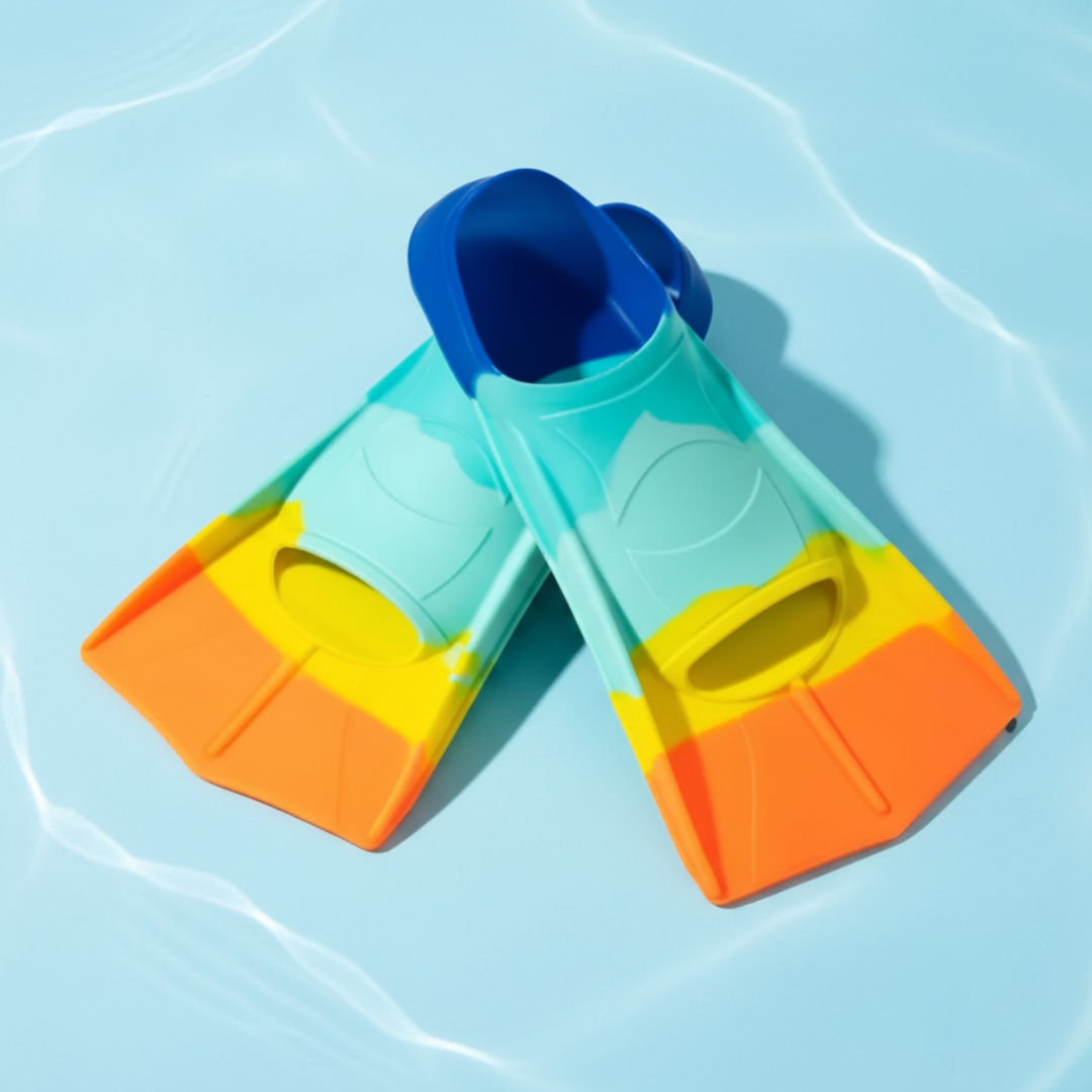 Orange and green short swim fins with yellow accents and blue foot openings.