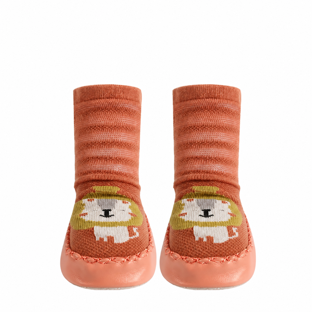 Orange striped sock shoes with lion faces, shown as a pair