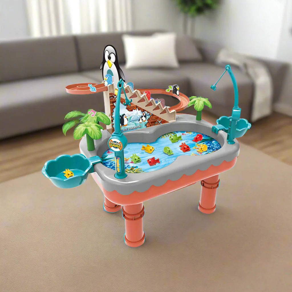 Orange penguin fishing table with a slide, colorful fish, and two side bowls
