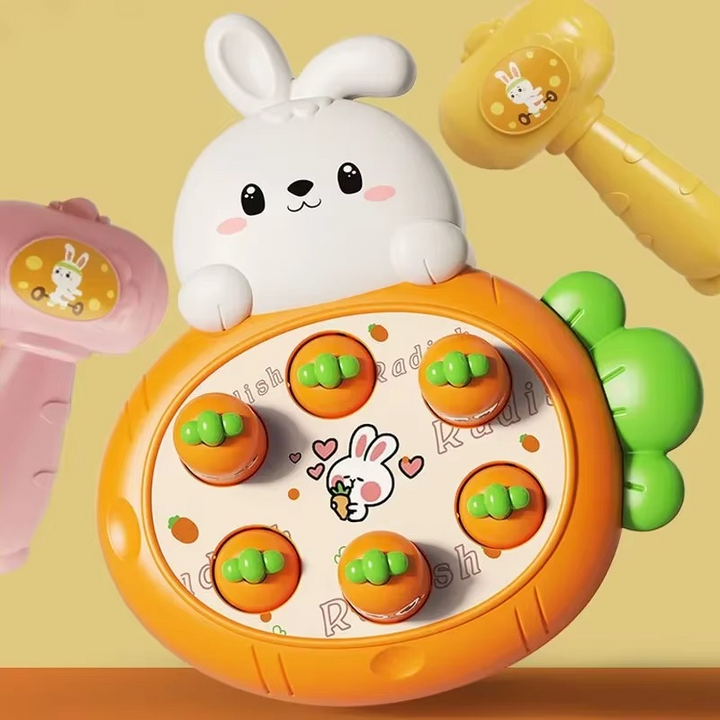 Orange rabbit-themed tapping board with green-topped targets and colorful hammers