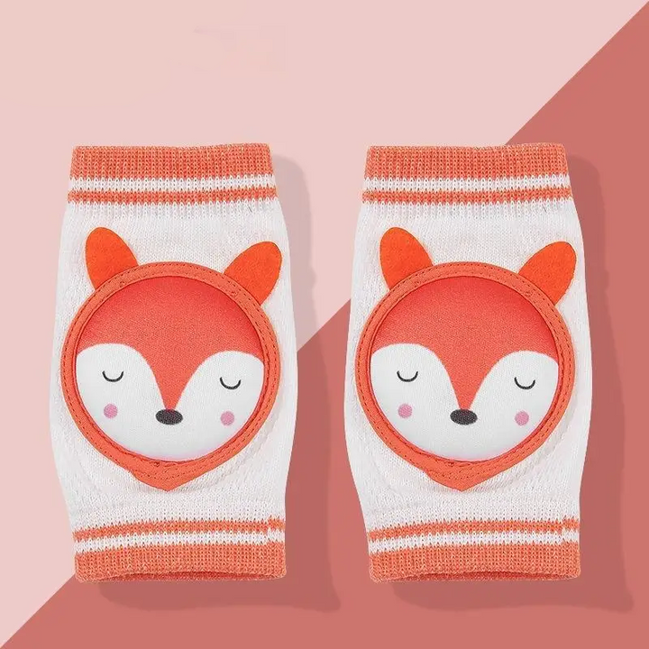 Pair of fox knee pads with orange trim and white knit sleeves.