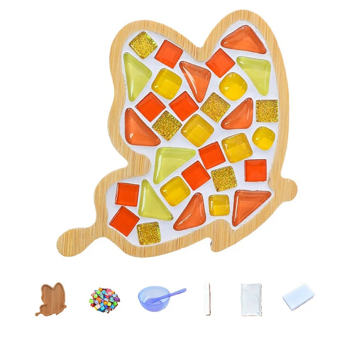Tall bamboo mosaic coaster with orange, yellow and green tiles, shown with crafting supplies
