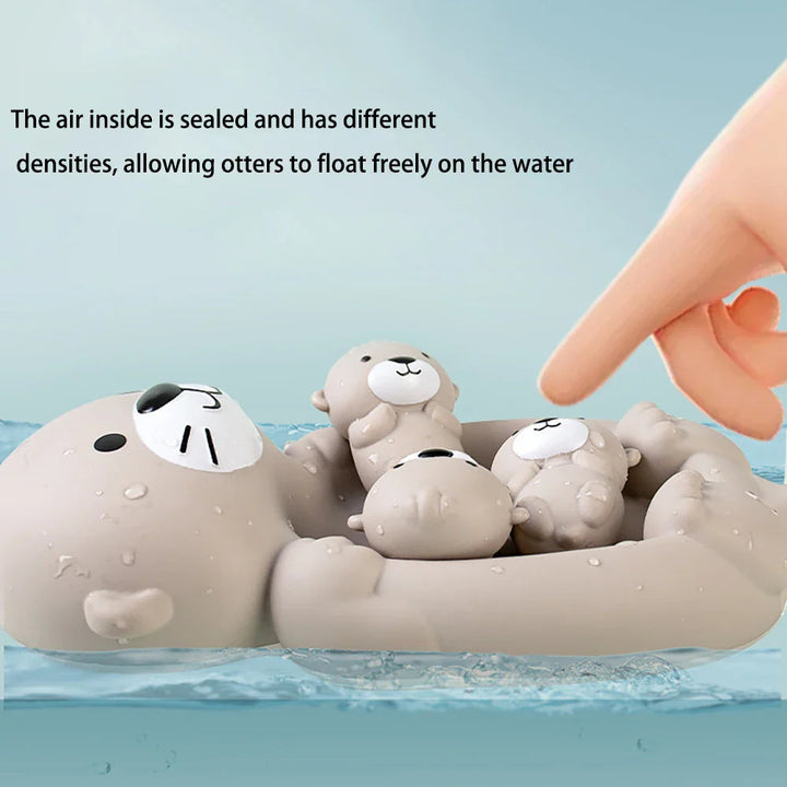 Large otter floating with three small otters on its belly as a hand reaches toward them