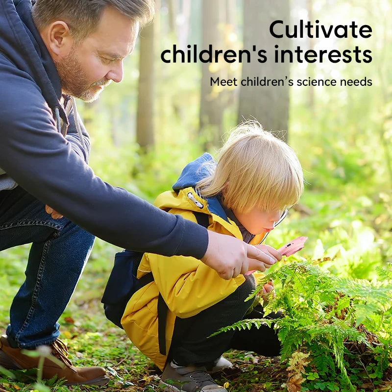 An adult and child examining plants outdoors with a pink handheld microscope