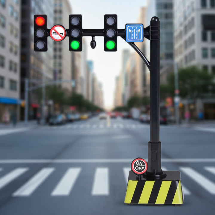 Overhead traffic-light model with road signs and a black-and-yellow striped base.
