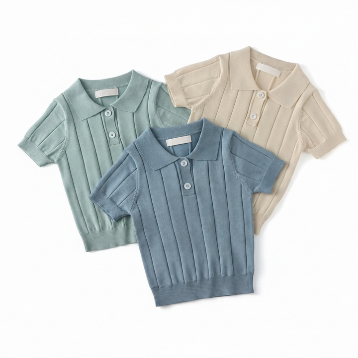 Green, cream, and blue short-sleeve knit polo shirts arranged in an overlapping group