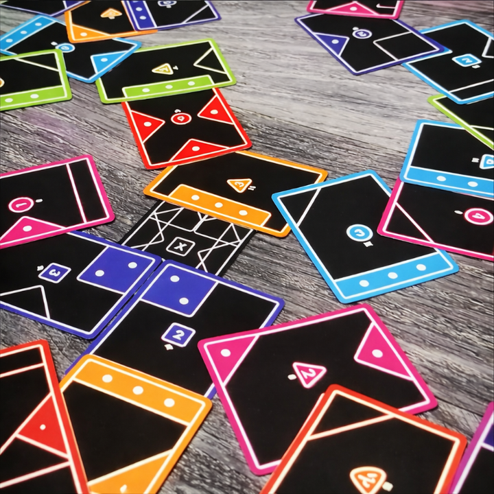 Overlapping shape cards with colored borders and dot values