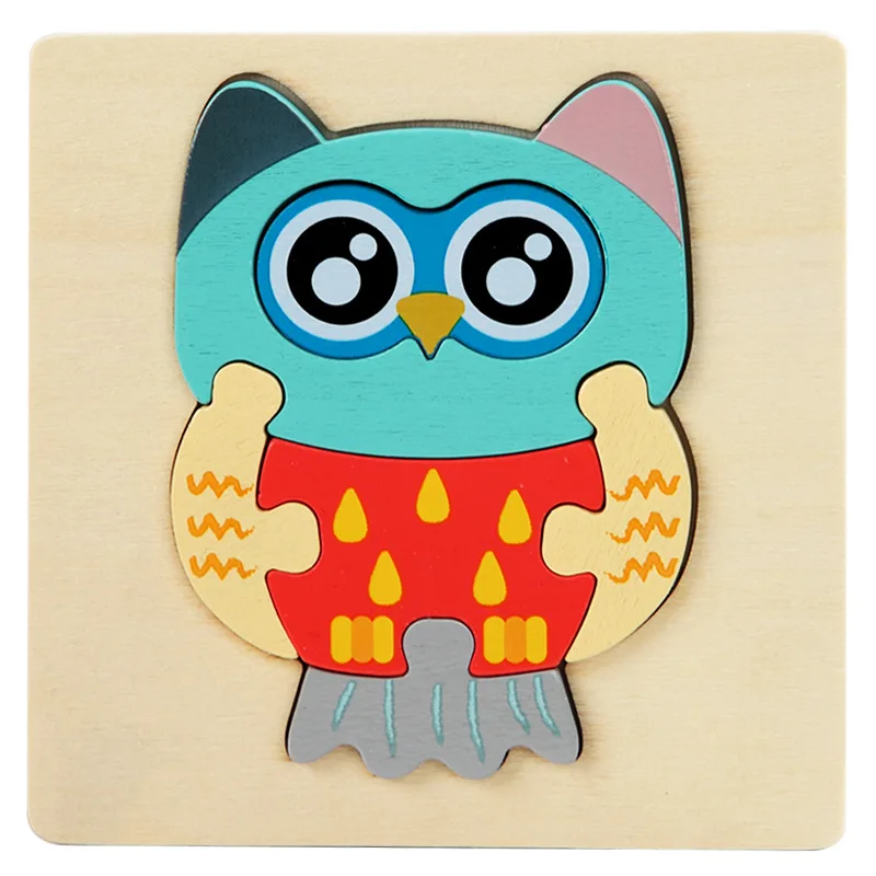 Owl wooden jigsaw puzzle with a turquoise head, large eyes, and red patterned body
