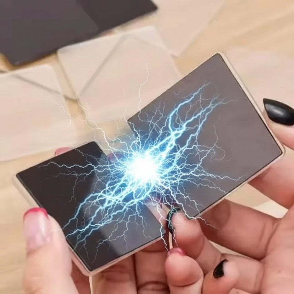 Hands holding two acrylic magnets side by side with a lightning-style illustration.