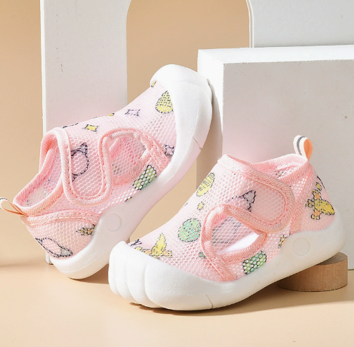 Pale pink mesh sandals with citrus prints, pink straps and white soles