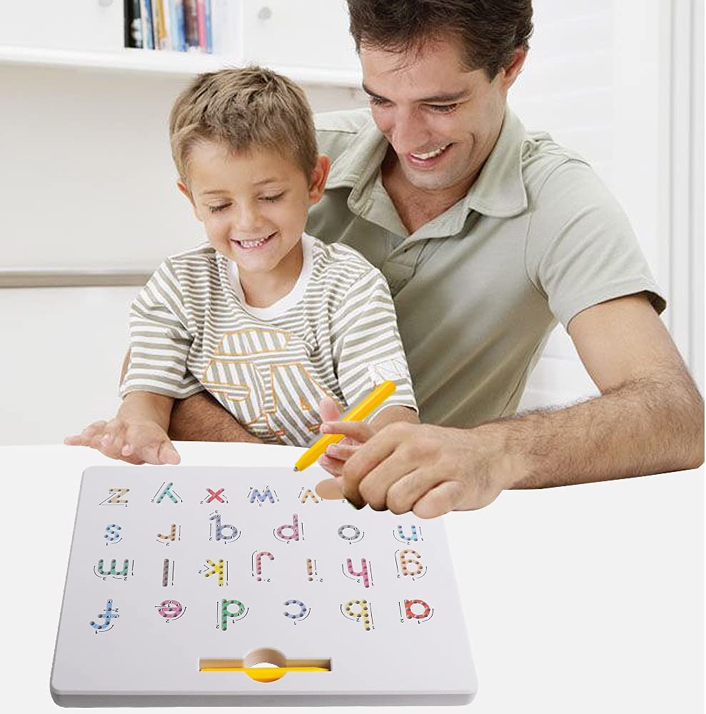 An adult and child practicing with a yellow stylus on a magnetic alphabet board.