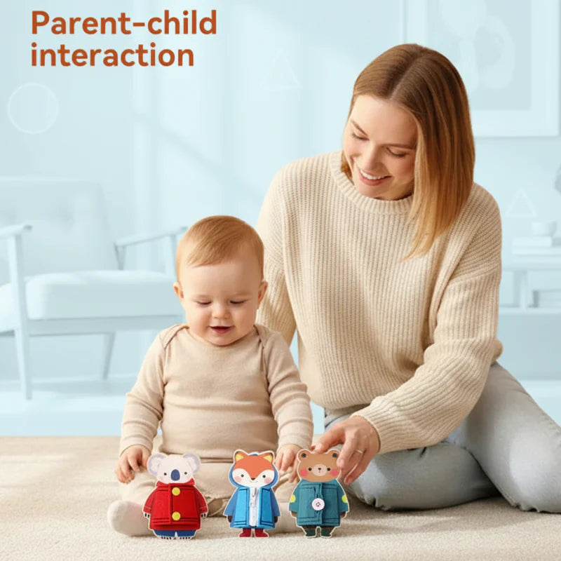 An adult and child playing with the koala, fox, and bear dressing toys