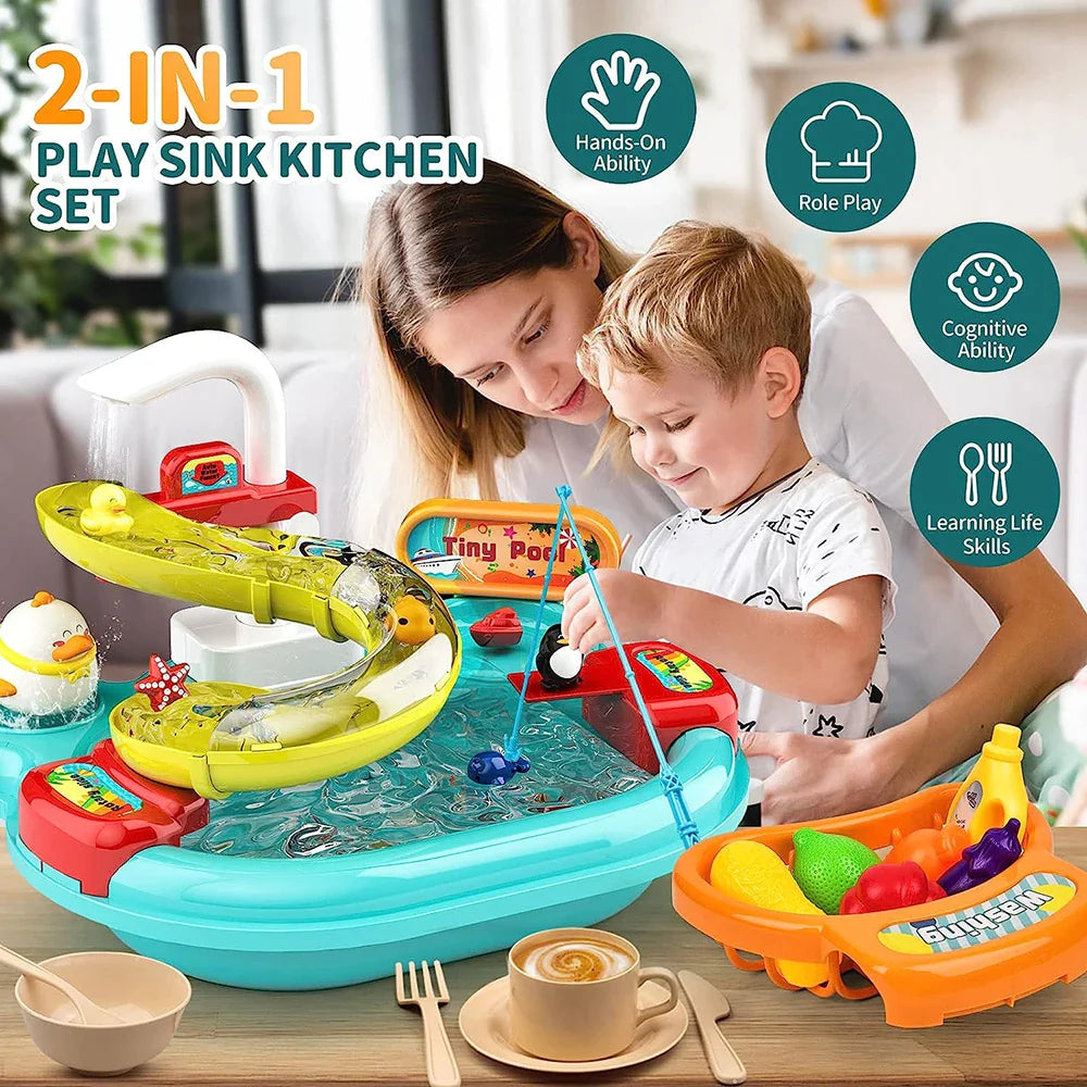 Adult and child using the green play kitchen sink with a fishing rod and toy dishes