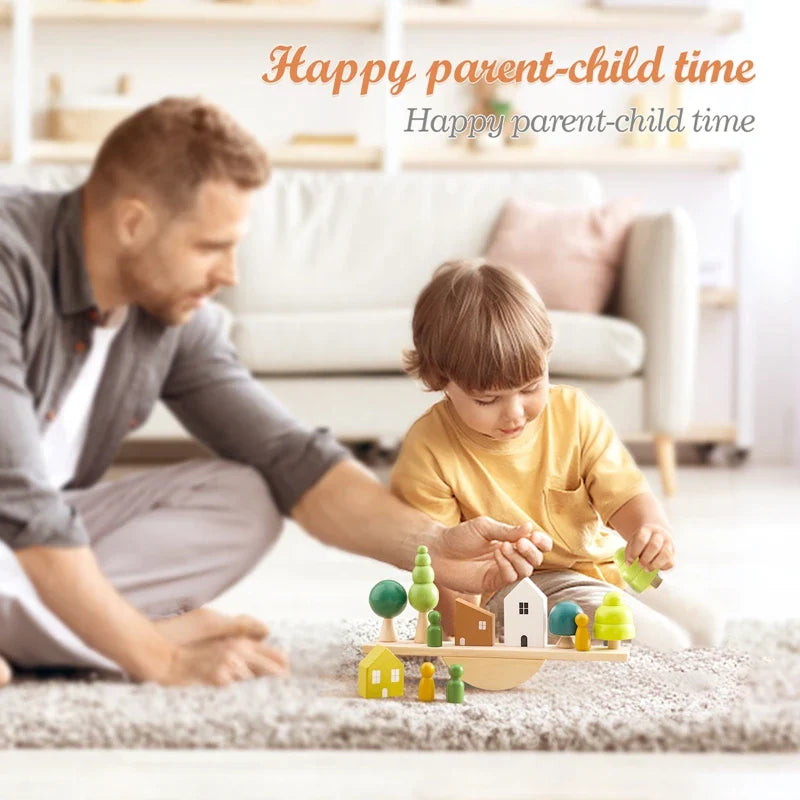 Adult and child playing together with a wooden house-and-tree balancing set