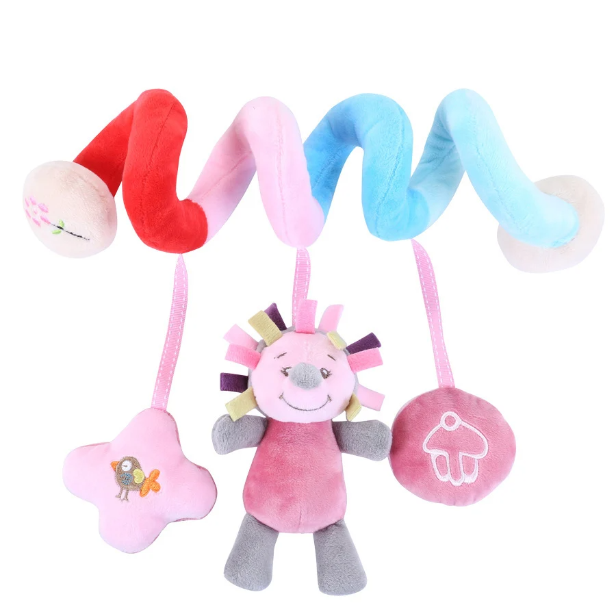 Pastel spiral activity toy with a hanging pink hedgehog, star, and round embroidered shape.