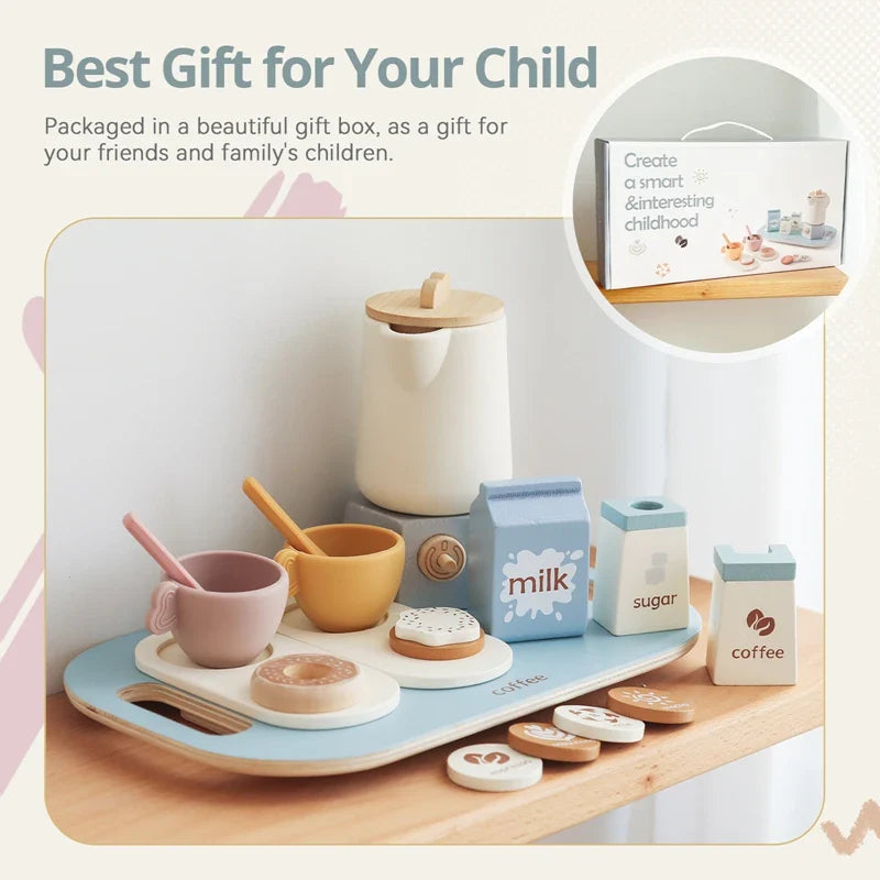 Toy tea set with pastel cups and pretend treats arranged on a tray beside its box