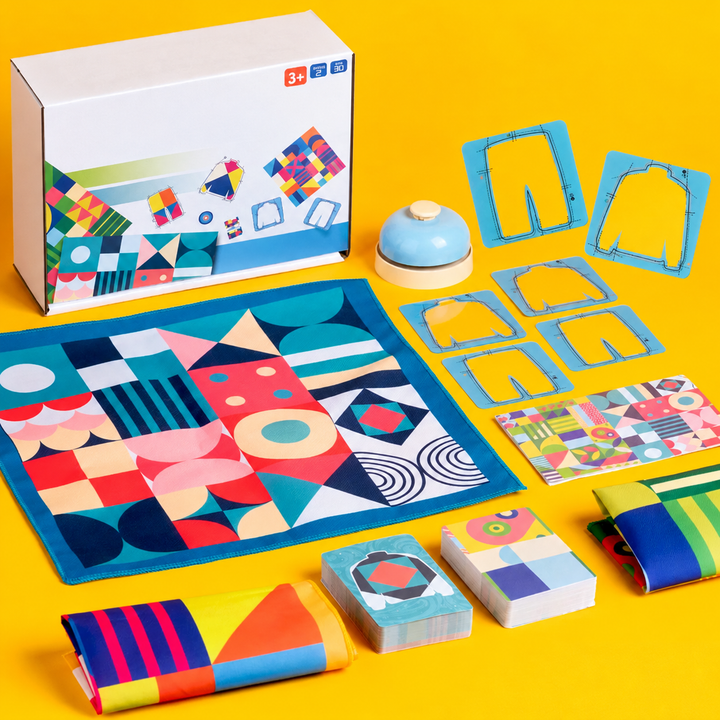 Pattern-matching card game with a colorful fabric board, clothing-shaped frames, goal cards, and a blue bell.