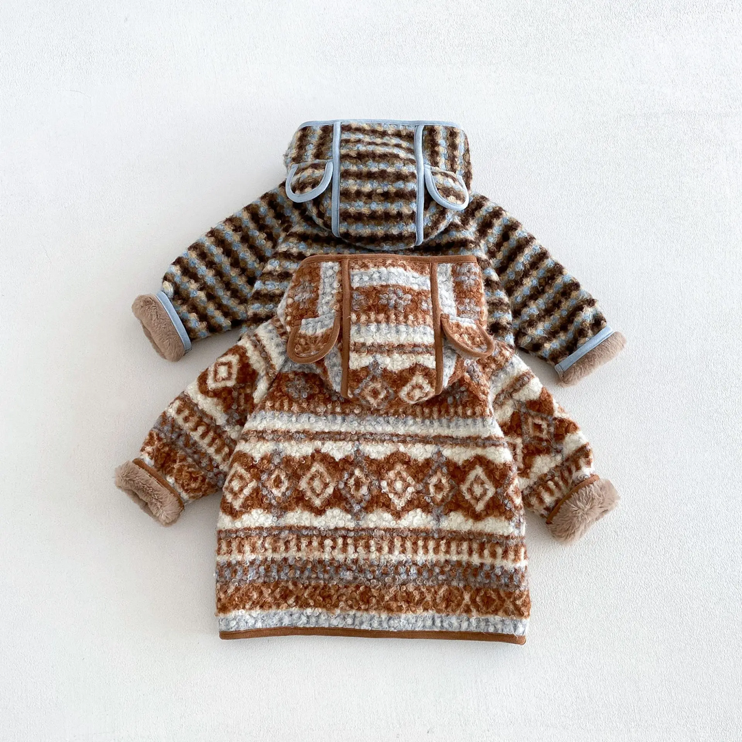 Back views of two patterned winter jackets with rounded ears on the hoods