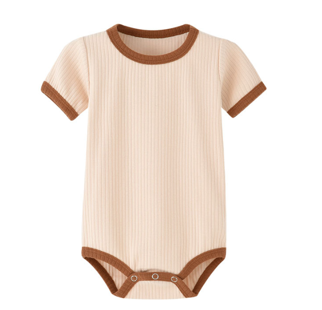Peach ribbed baby romper with brown neckline, sleeve edges, and leg trim