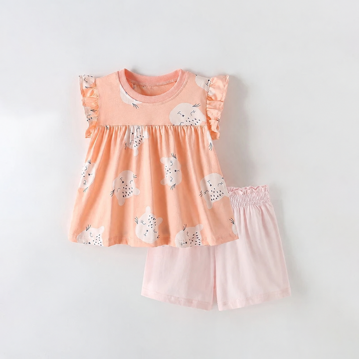 Peach cat-print gathered top with flutter sleeves and pale pink shorts