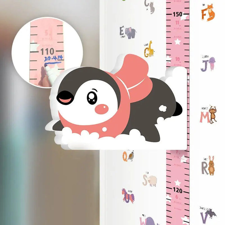 Penguin character in a pink hat beside a pink height scale and alphabet illustrations