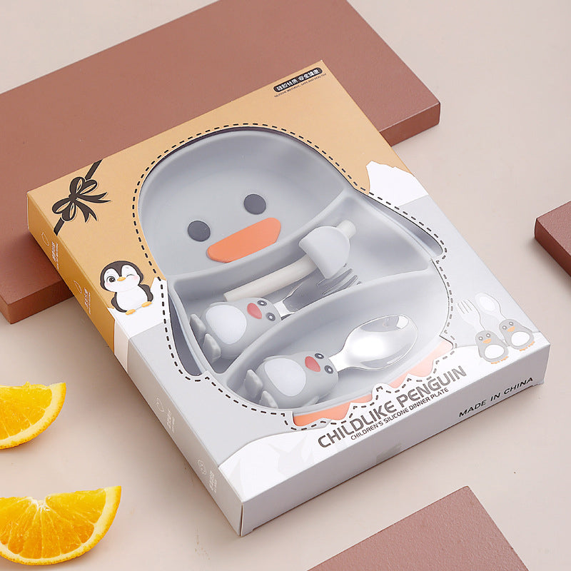 Penguin-shaped plate, matching cutlery, and straw displayed in a windowed box