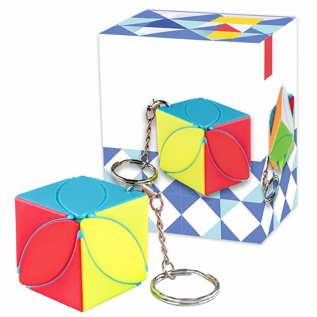Colorful cube puzzle key ring with curved petal-shaped sections beside its box