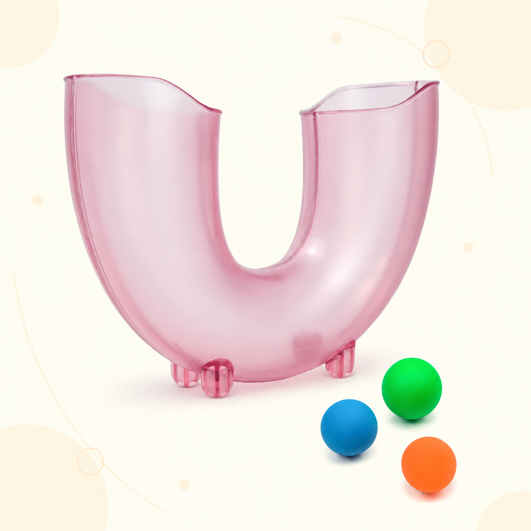 Pink U-shaped ball skills tube with blue, green, and orange balls