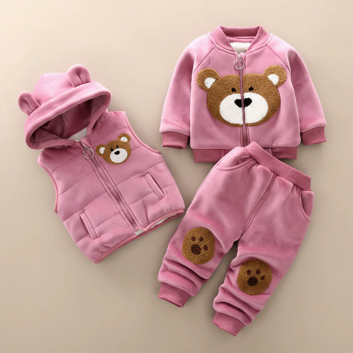 Pink hooded bear-ear vest, bear-face zip top, and matching pants with paw details
