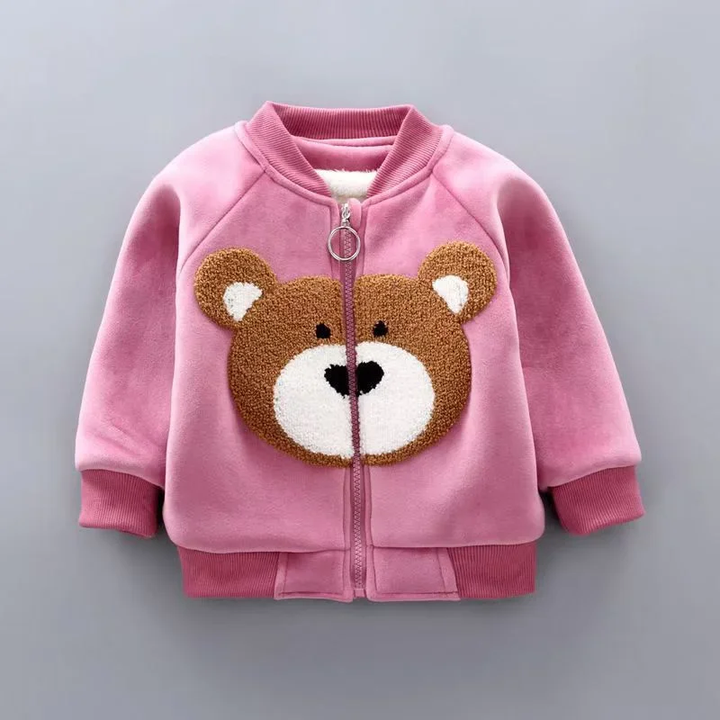 Pink zip-front top with a large textured bear face and ribbed cuffs and hem