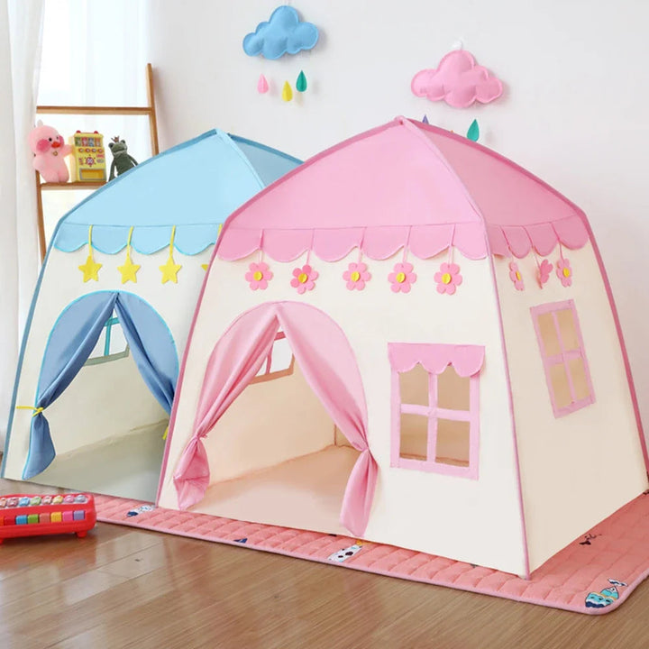 Pink and blue castle-style play tents with peaked roofs and tie-back door curtains