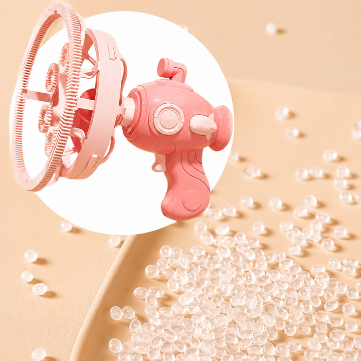 Pink bubble gun displayed above a cluster of bubbles on a peach background
