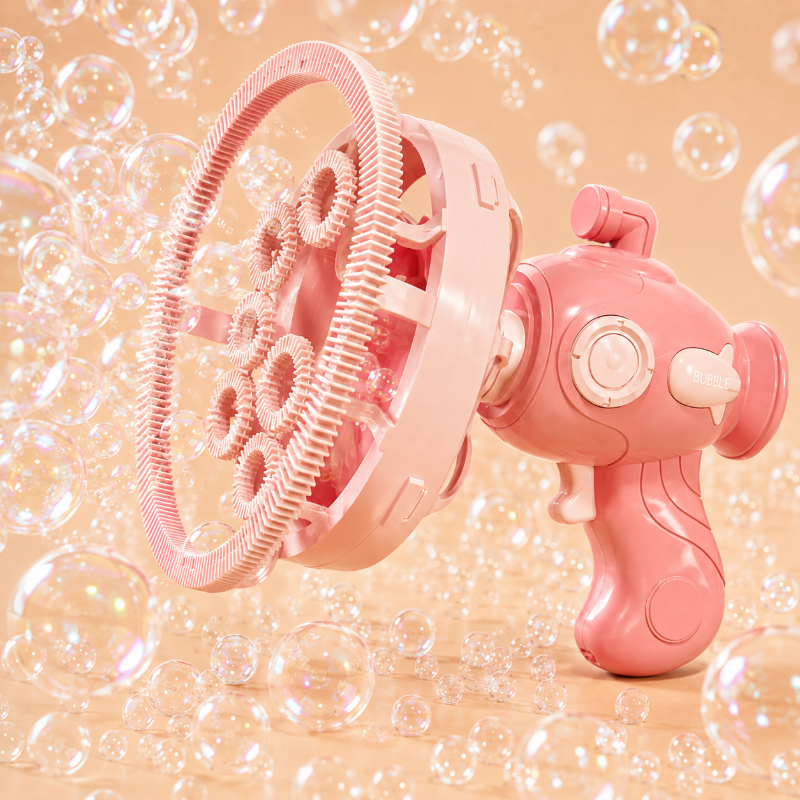 Pink bubble gun with a large circular nozzle head surrounded by bubbles