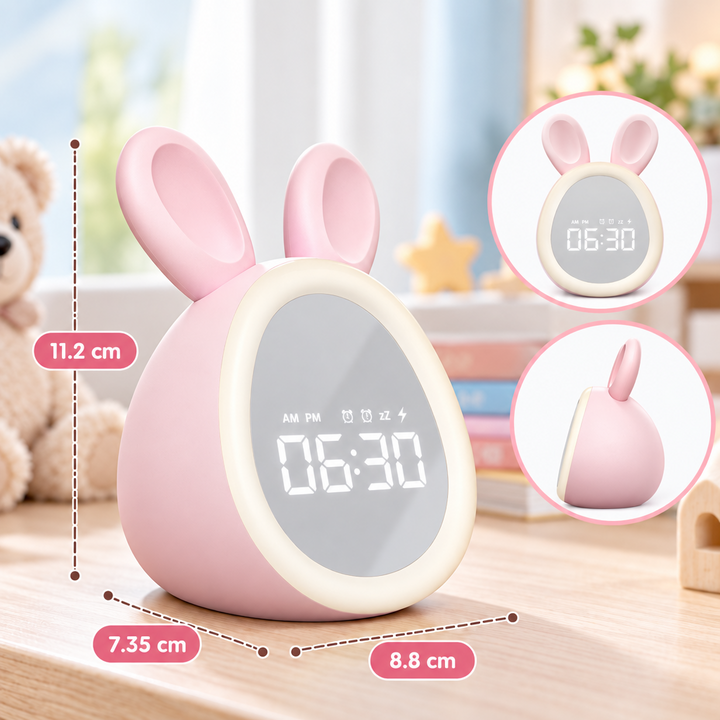 Pink bunny alarm clock measuring 11.2 cm high, 8.8 cm wide and 7.35 cm deep