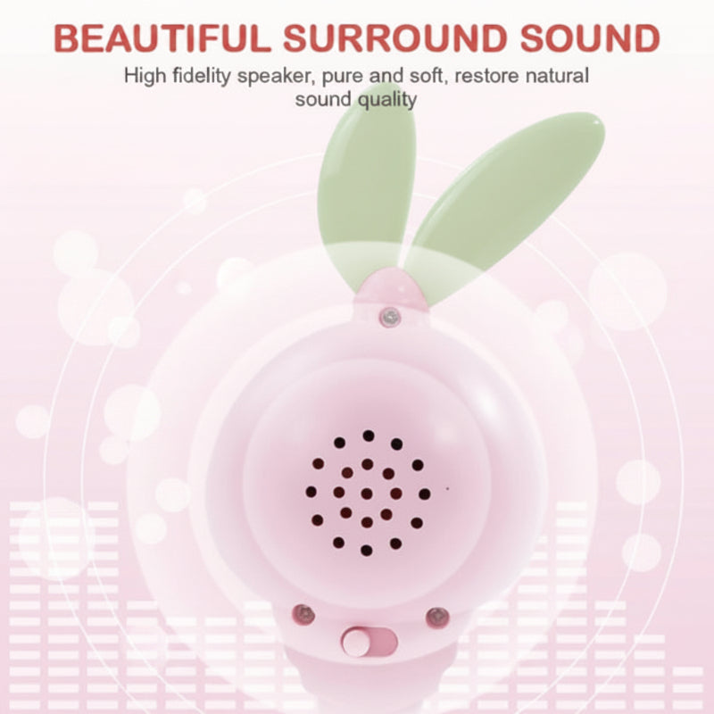 Rear view of a pink bunny rattle showing the speaker and controls