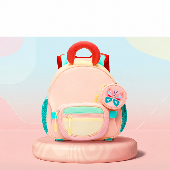 Pink school backpack with a butterfly pouch displayed on a round pink platform