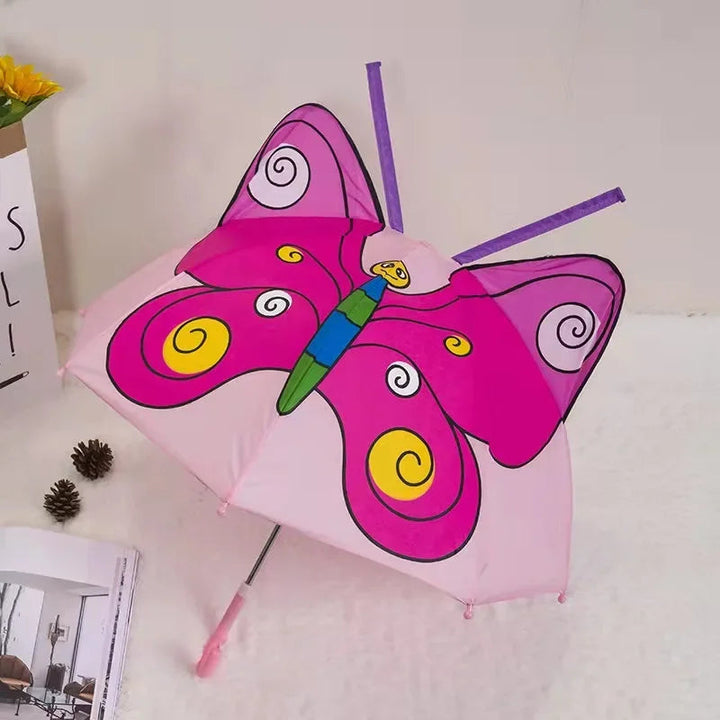 Pink butterfly umbrella with patterned wings and raised antenna details