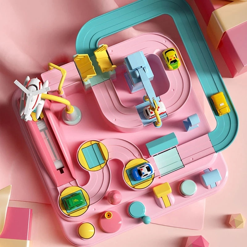 Overhead view of a pink car track playset with a turquoise outer roadway and mini cars