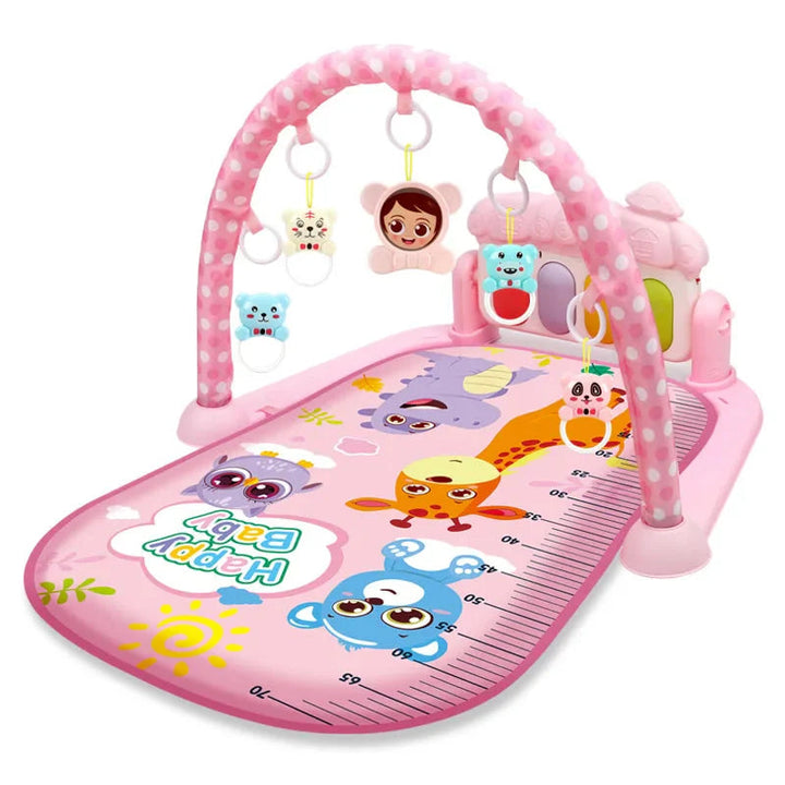 Pink baby gym with a polka-dot arch, hanging toys, and a cartoon animal mat