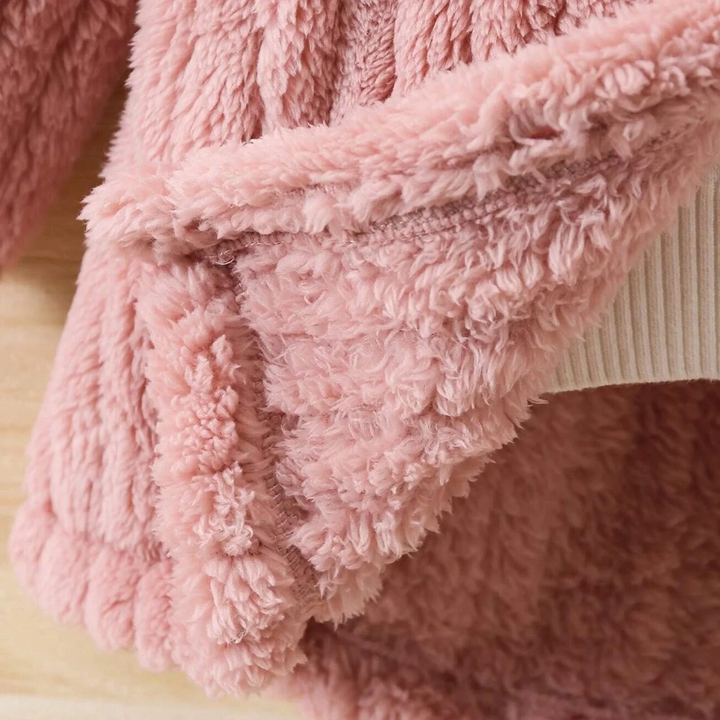 Close-up of the pink winter coat&