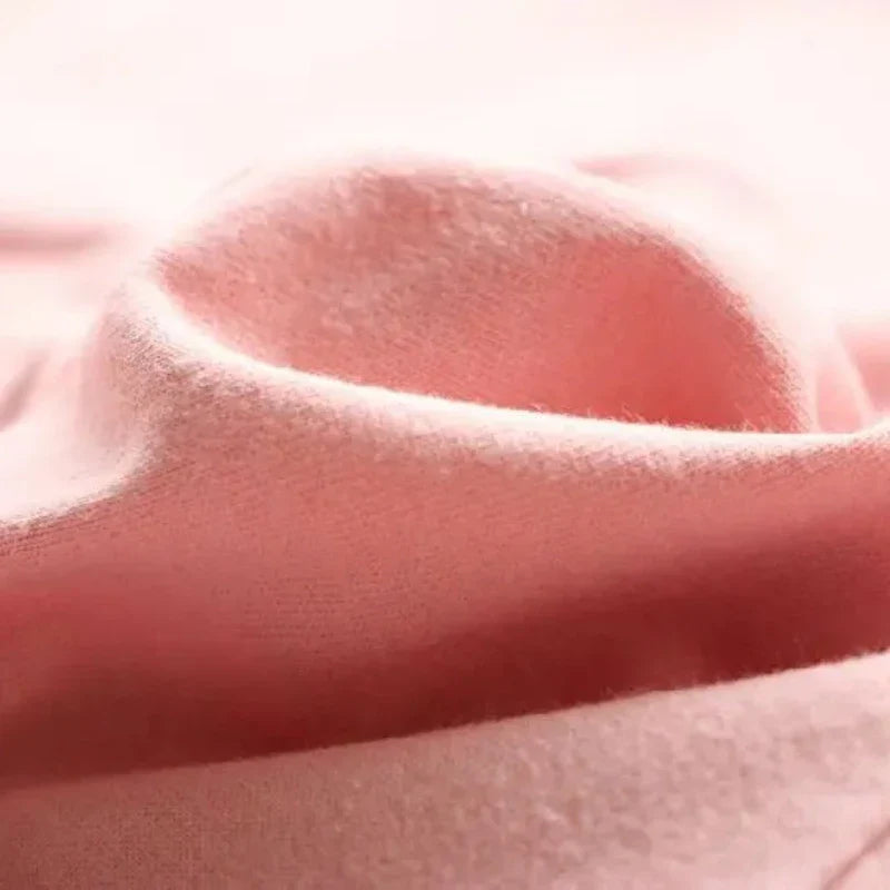 Close-up of the pink cotton fabric used in the girls&