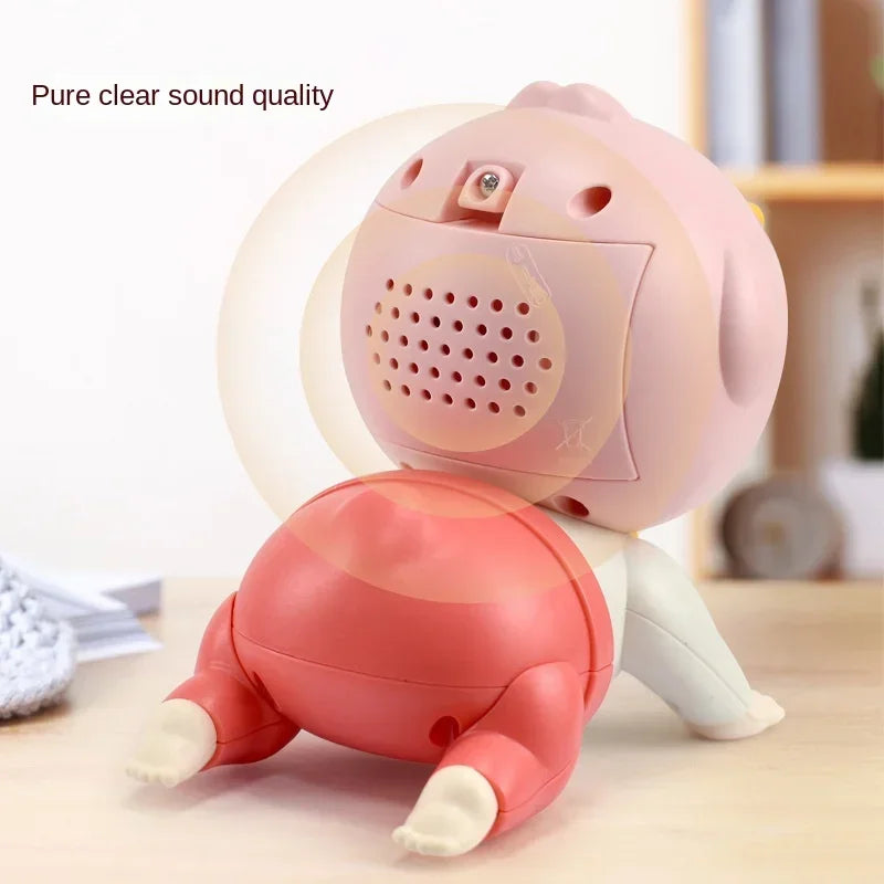 Rear view of the pink crawling doll showing its speaker grille and switch