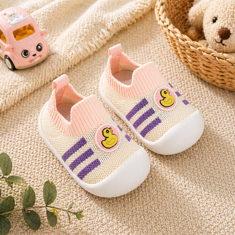 Duck-detail baby sock shoes with pink cuffs, purple stripes, and white soles.