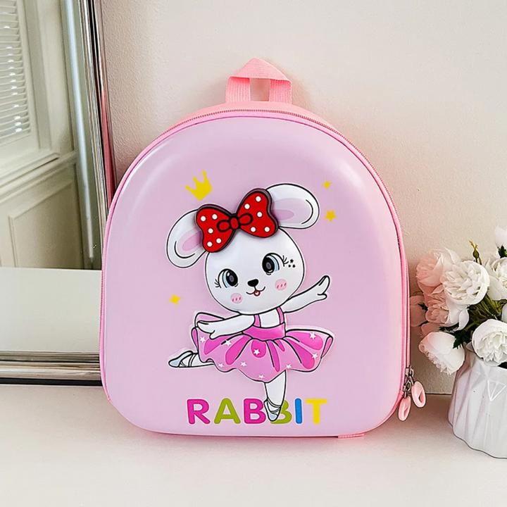 Pink rabbit backpack with a red bow and dancing rabbit design