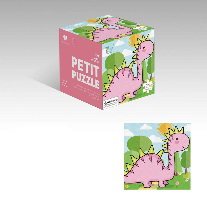 Pink dinosaur jigsaw puzzle with green scenery and a matching cube box