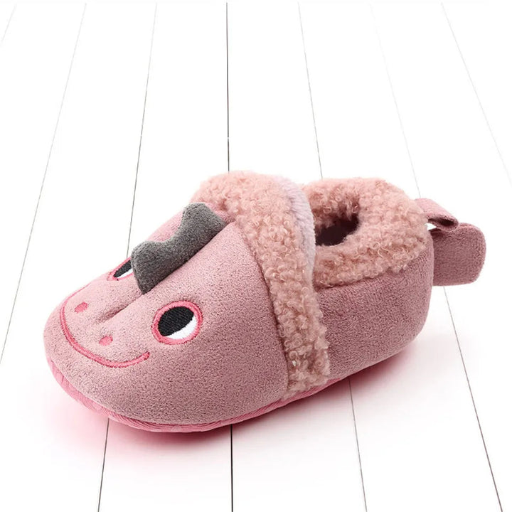 Pink dragon baby slipper with a gray crest and fuzzy cuff.