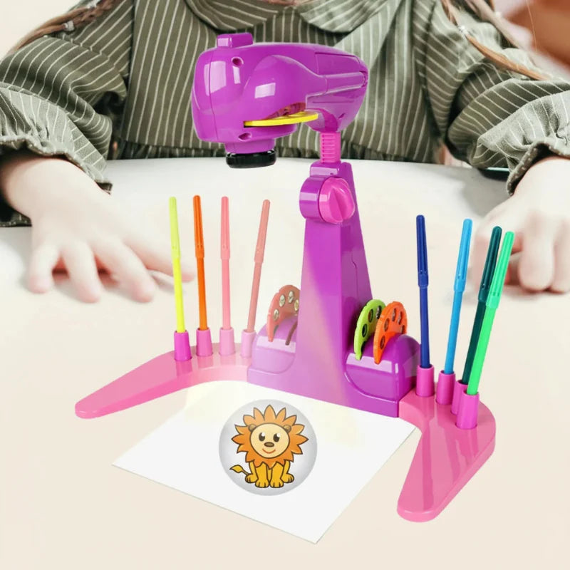 Pink drawing projector with pencils and slides organized around a projected lion picture.