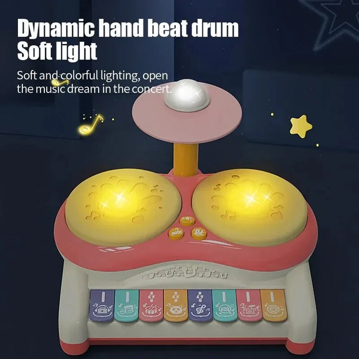 Pink drum toy with illuminated yellow drum pads and colorful keyboard keys