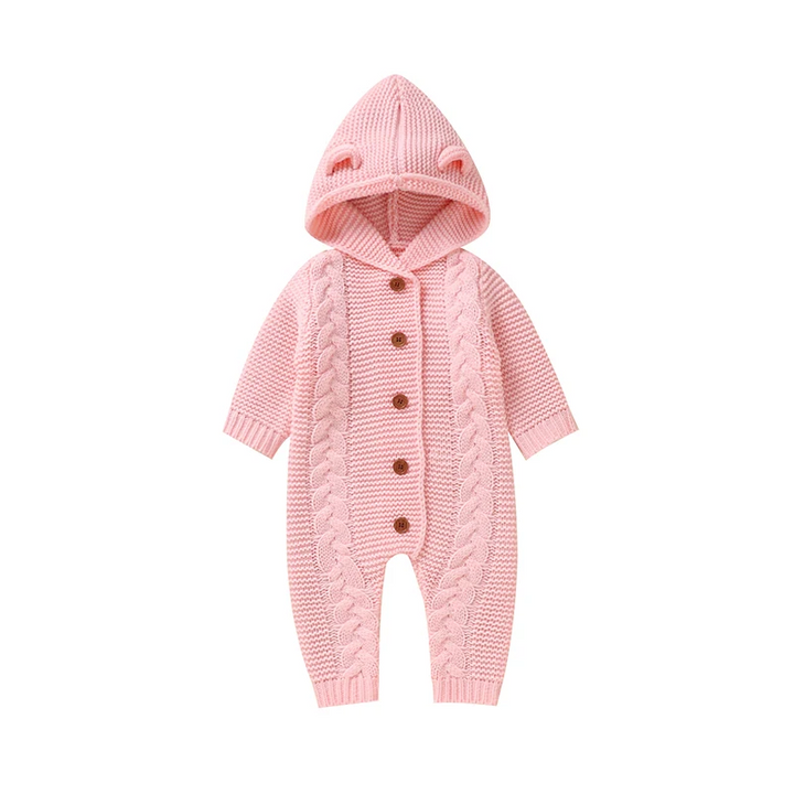 Pink cable-knit baby jumpsuit with small hood ears and a button-up front